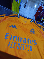 Футболка игровая Реал Мадрид 2024/2025 гостевая оранжевая